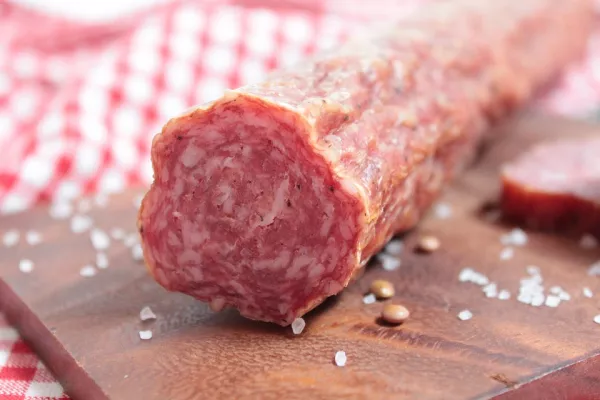 It is curious that last year sausages rose in price within the range of 7.5-9.5%. And the main argument of sausage producers is precisely that cheap imported beef will help to keep the rise in prices for final products. It will not work to replace it with cheaper meat (for example, chicken), at least in GOST sausages. For example, in the classic doctor's sausage recipe for 1 kilogram, you must definitely use 250 grams of beef. If earlier there were isolated cases of the release of a fake GOST doctoral thesis, then in the last couple of years this cannot be done: all data is recorded in the information system "Mercury" - if more chicken has entered the conveyor, it will not work to produce beef sausage from it, says the chairman of the board of the National Union of Meat Processors (NSM) Yulia Panferova.  According to her, processors would be happy to buy Russian beef, but its choice is not rich and the quality leaves much to be desired. According to Yulia Panferova, the most common problems are injections of raw materials (water or brine), as well as microbiological disturbances, due to which such meat cannot be used in the production of dried sausages. Meat processors are ready to buy raw materials in Kazakhstan too - the absence of borders makes delivery much easier. But while manufacturers are not familiar with the quality of these products, they are ready to make a decision only after an audit of Kazakhstani enterprises. There are fewer violations in Brazilian beef, where the production of cheap raw materials has long been established, says Panferova.  Sausage in Russia is a kind of barometer of the situation in the economy. In a crisis, its consumption is always growing Without imports, beef prices will soar by 25%, which will lead to an increase in prices for finished products, Panferova predicts. But processors cannot raise the cost of their products so sharply - it limits their purchasing power. In addition, recently, Russian President Vladimir Putin, at a meeting with the head of the FAS, Maxim Shaskolsky, indicated that an important task for today is price control.  High-quality beef cannot be cheap by definition, we want low prices - we buy poultry and pork, livestock breeders say. But sausage is a completely different matter. For our country, sausage is not just a product, but a kind of barometer of the situation in the economy. From 1 kilogram of meat, after boiling, you can get 600 grams of the finished product, and by making boiled sausage from the same piece of meat - already 1.1-1.2 kilograms. It is easier to feed the population with sausage than with meat. In any crisis, the consumption of sausages and frankfurters is growing - people tend to eat and save money.  According to Yulia Panferova, 100,000 tons of imported beef will not make a difference for the country's beef farming, which produces more than 1.5 million tons a year. Rather, it is a point measure that will relieve tension here and now. Import will be used only in the production of finished products. And sausage producers will continue to focus on domestic raw materials - the total need for beef processing is estimated at 600,000 tons.  In addition, livestock breeders can count on state support. So, from 2023, part of the cost of cattle production will be reimbursed. We are talking about products that will be recycled. In 2023, 600 million rubles will be allocated for this measure.